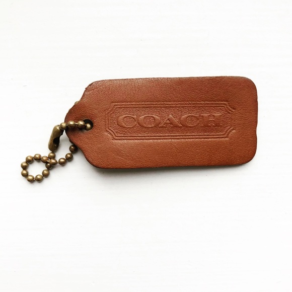 coach dog tag